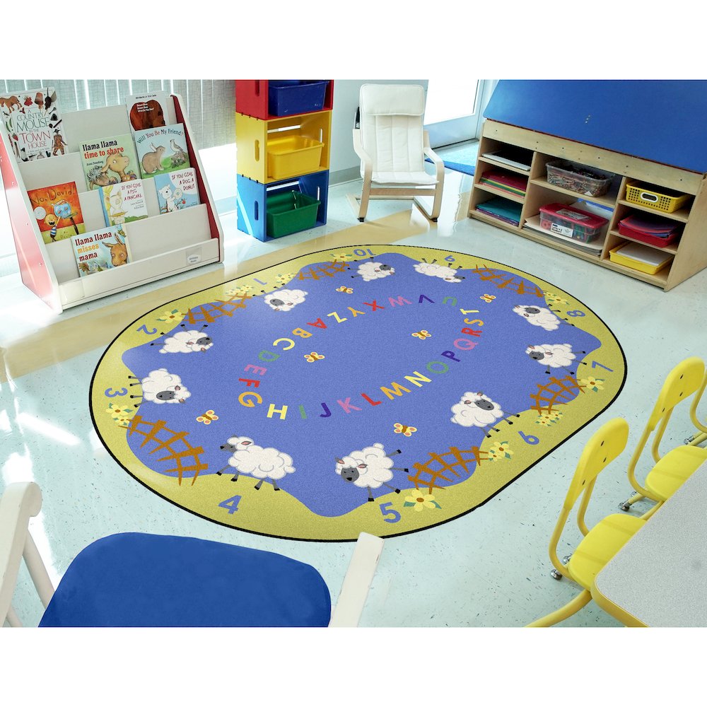 Kid Essentials Lamby Pie 5'4" x 7'8" Oval Area Rug in Color Multi. Picture 3