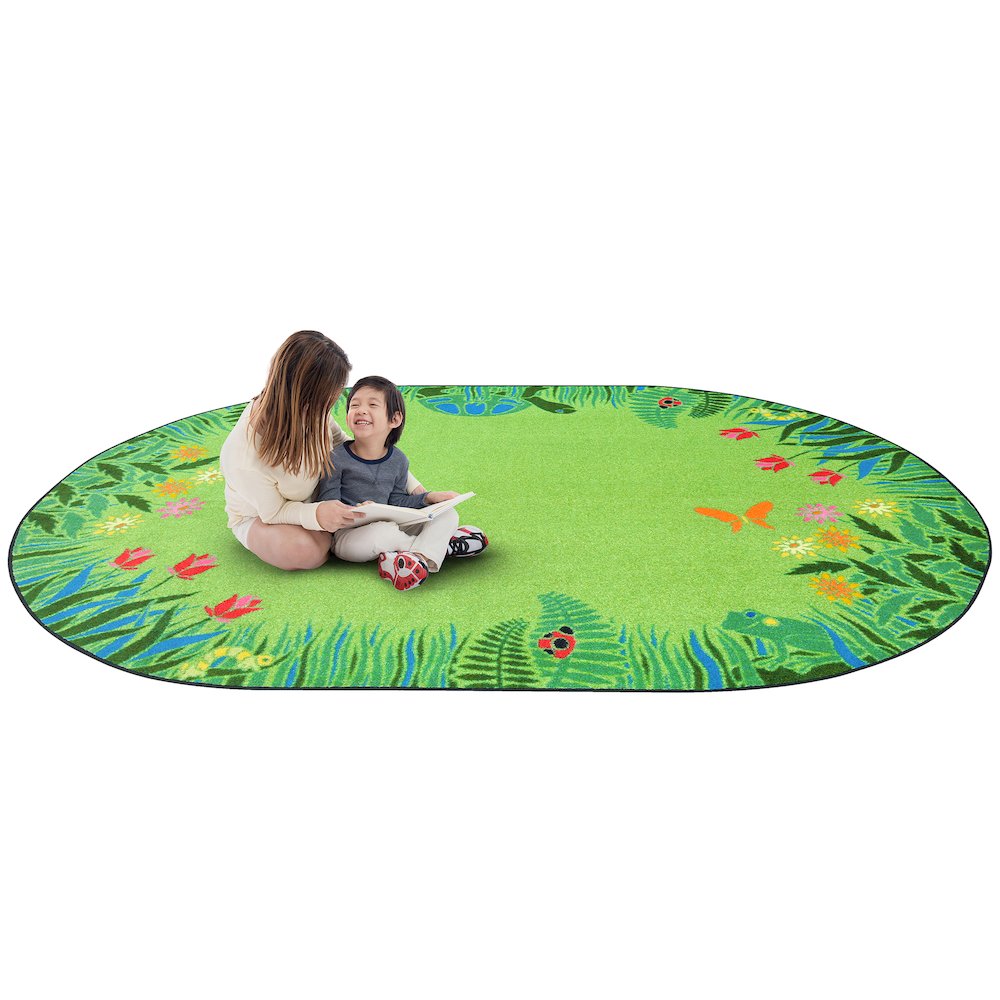 Kid Essentials Merry Meadows 7'8" x 10'9" Oval Area Rug in Color Green. Picture 2