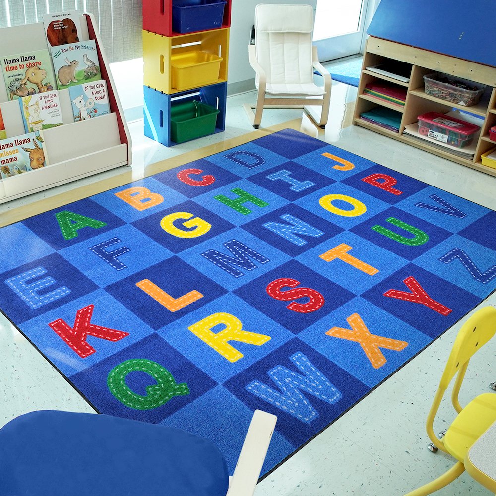 Kid Essentials Patchwork Letters 5'4" x 7'8" Area Rug in Color Multi. Picture 3