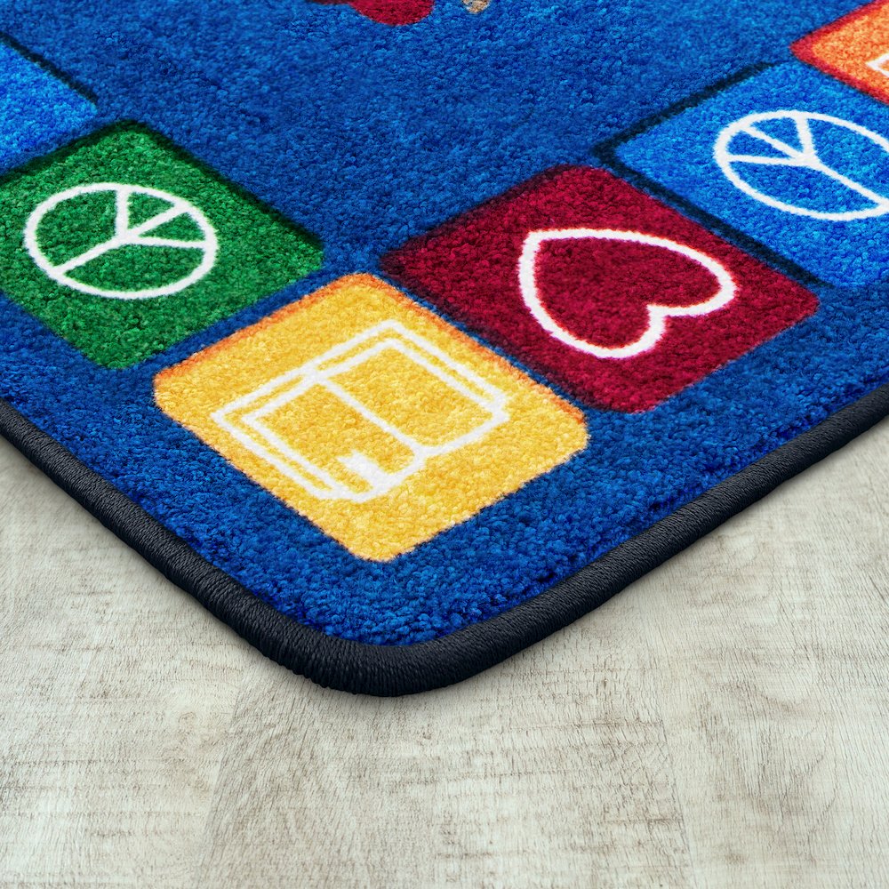 Kid Essentials Peaceful Readers 5'4" x 7'8" Area Rug in Color Multi. Picture 2