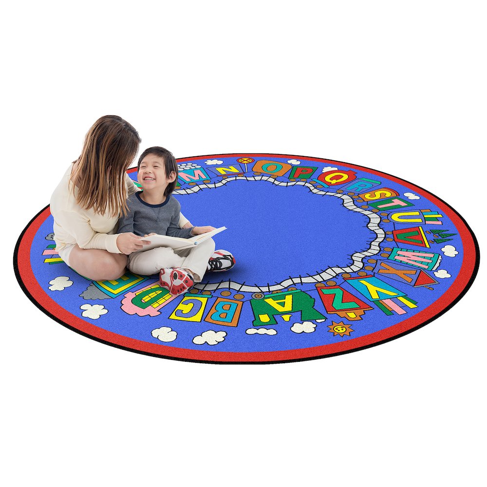 Kid Essentials Reading Train 7'7" Round Area Rug in Color Multi. Picture 2