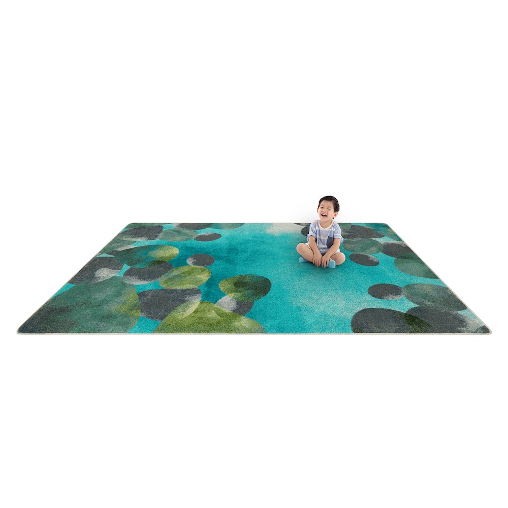 Kid Essentials Riverstone 5'4" x 7'8" Area Rug in Color Teal. Picture 5