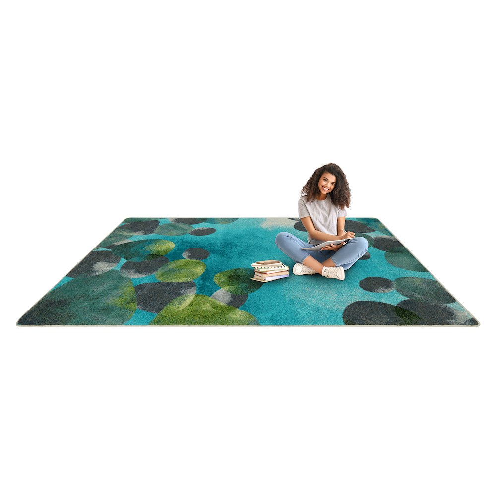 Kid Essentials Riverstone 5'4" x 7'8" Area Rug in Color Teal. Picture 4