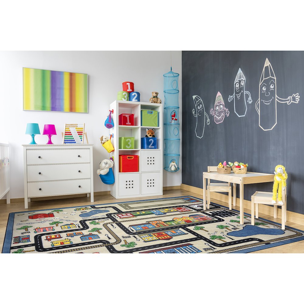 Kid Essentials Tiny Town 5'4" x 7'8" Area Rug in Color Pewter. Picture 3