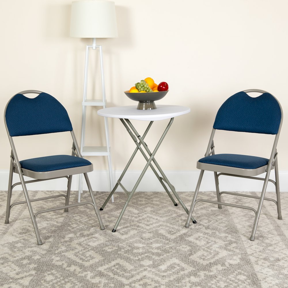 2 Pack HERCULES Series Ultra-Premium Triple Braced Navy Fabric Metal Folding Chair with Easy-Carry Handle. Picture 2