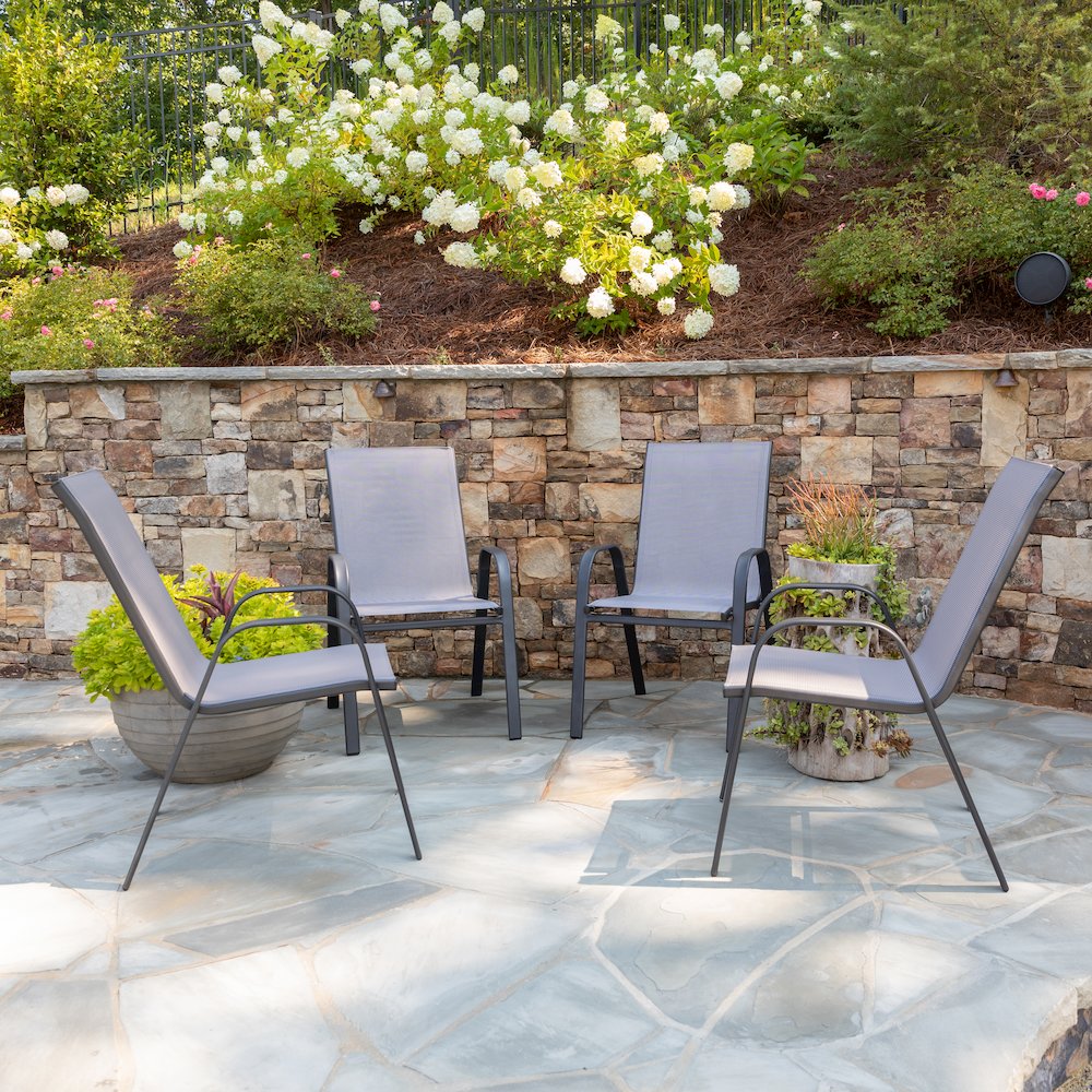 4 Pack Gray Outdoor Stack Chair with Flex Comfort Material and Metal Frame. Picture 2