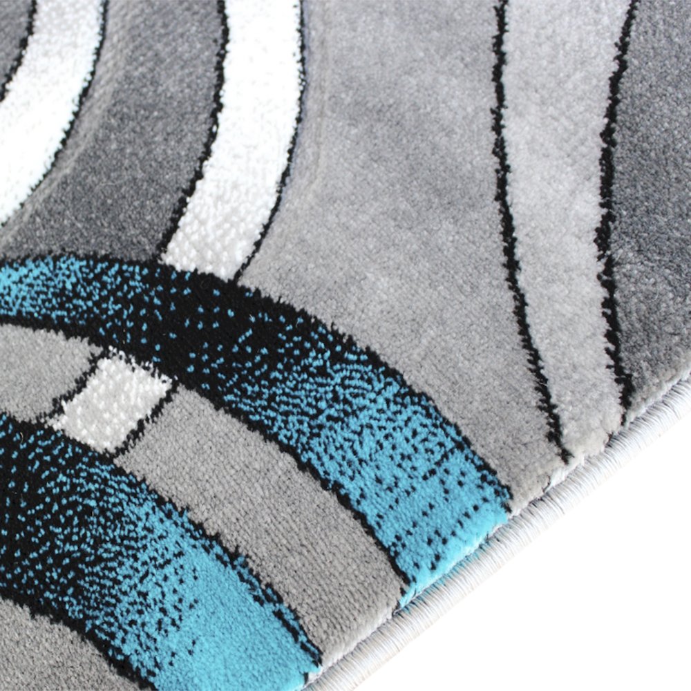 5' x 7' Turquoise Swirl Olefin Area Rug with Jute Backing. Picture 6