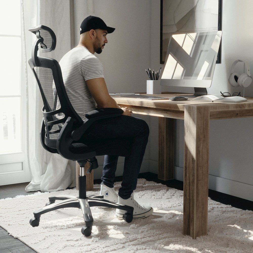 High-Back Black Mesh Swivel Executive Office Chair and Adjustable Headrest. Picture 1