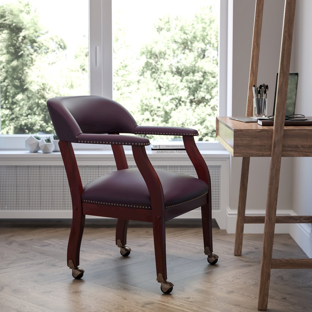 Burgundy LeatherSoft Conference Chair with Accent Nail Trim and Casters. Picture 2