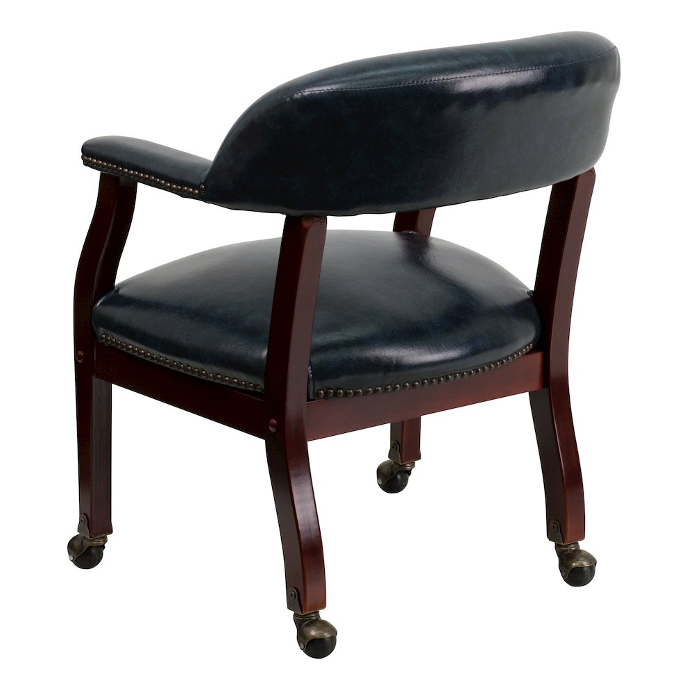 Navy Vinyl Luxurious Conference Chair with Accent Nail Trim and Casters. Picture 7