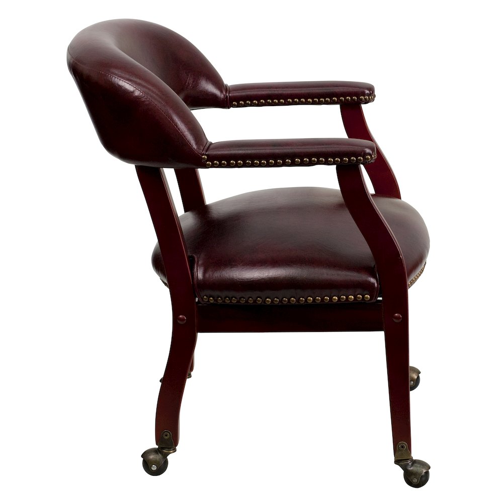 Oxblood Vinyl Luxurious Conference Chair with Accent Nail Trim and Casters. Picture 8