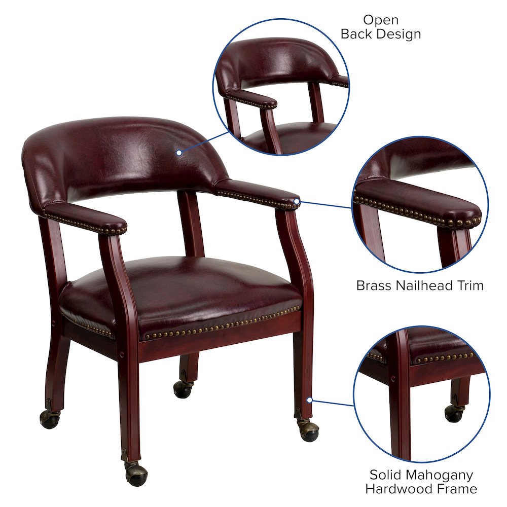 Oxblood Vinyl Luxurious Conference Chair with Accent Nail Trim and Casters. Picture 4