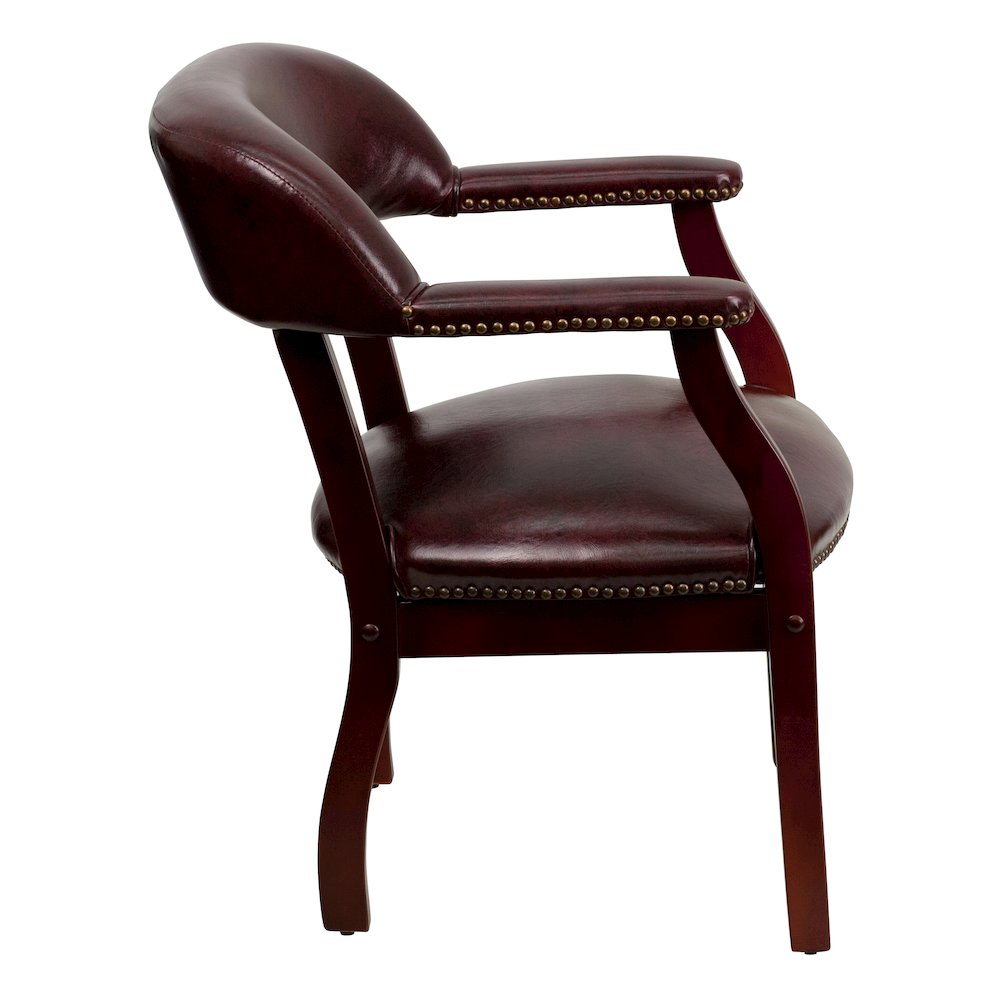 Oxblood Vinyl Luxurious Conference Chair with Accent Nail Trim. Picture 8