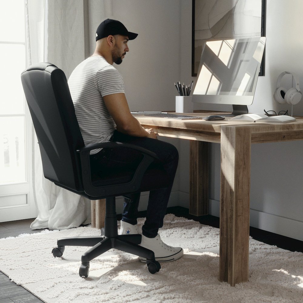 Flash Fundamentals Mid-Back Black LeatherSoft-Padded Task Office Chair with Arms. Picture 1