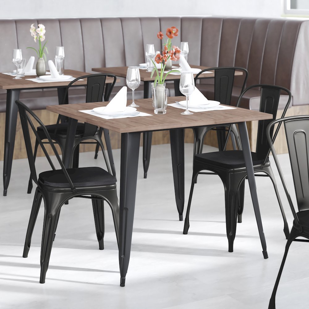 Black Metal Indoor-Outdoor Stackable Chair with Black Poly Resin Wood Seat. Picture 2