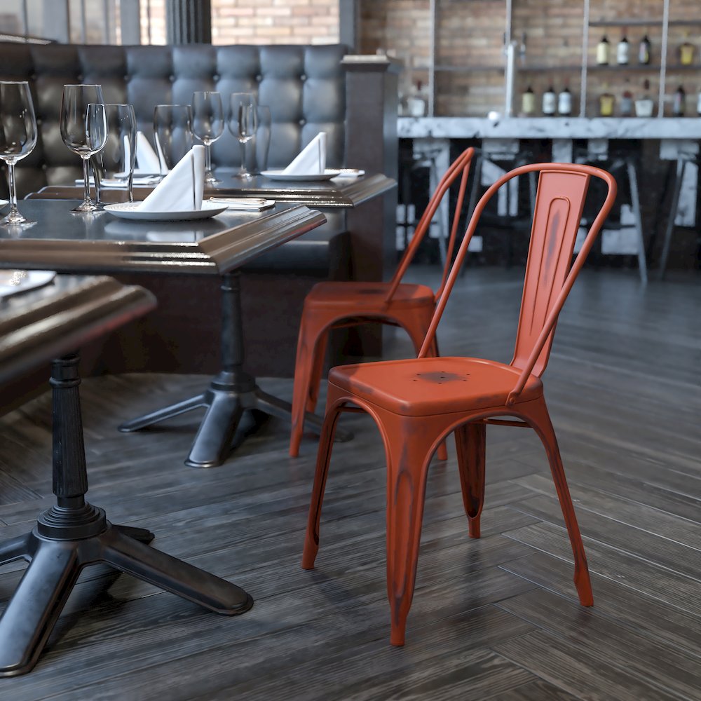 Distressed Kelly Red Metal Indoor-Outdoor Stackable Chair. Picture 2