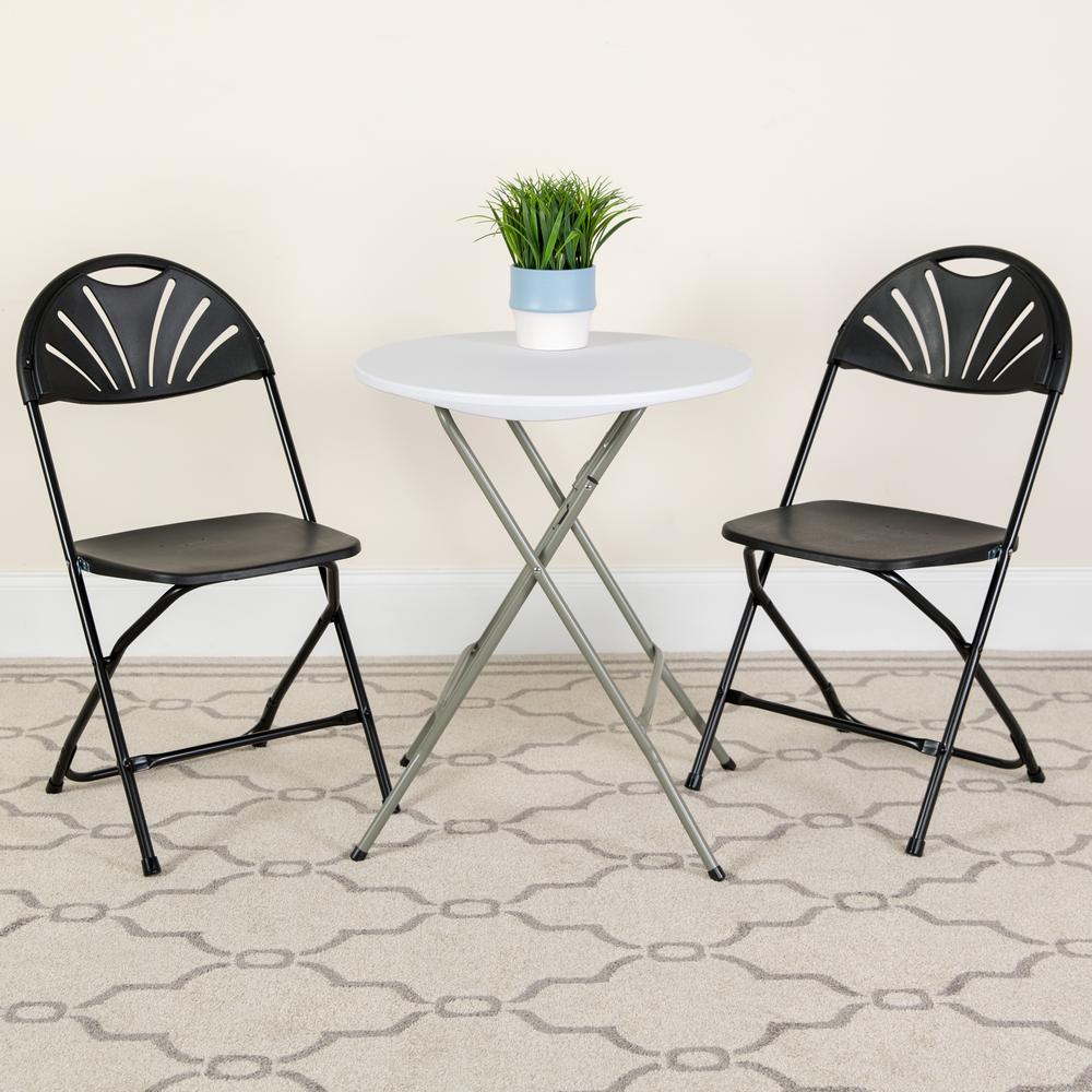 650 lb. Capacity Black Plastic Fan Back Folding Chair. Picture 18