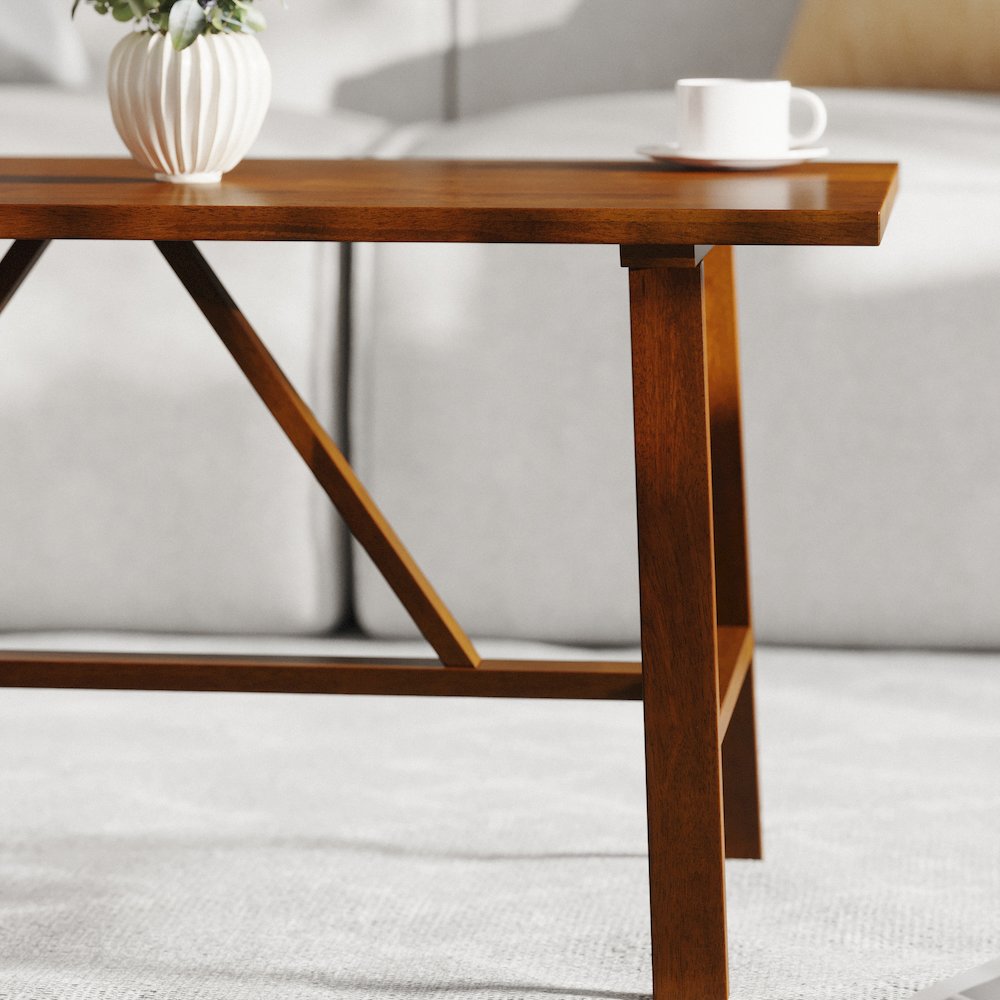 Eli Solid Wood Farmhouse Coffee Table, Trestle Style Accent Table in Walnut. Picture 7
