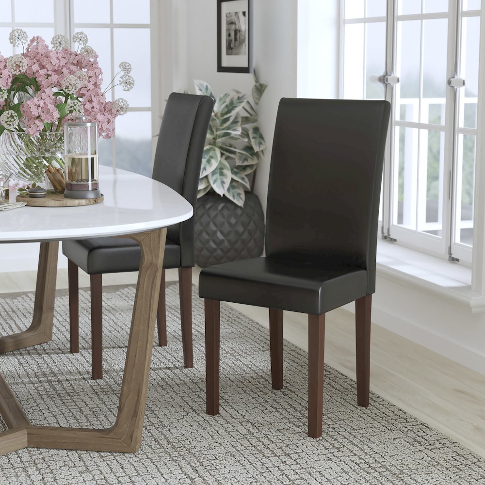 Black LeatherSoft Upholstered Panel Back Mid-Century Parsons Dining Chair. Picture 2