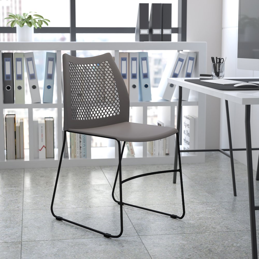 HERCULES Series 661 lb. Capacity Gray Stack Chair with Air-Vent Back and Black Powder Coated Sled Base. Picture 11