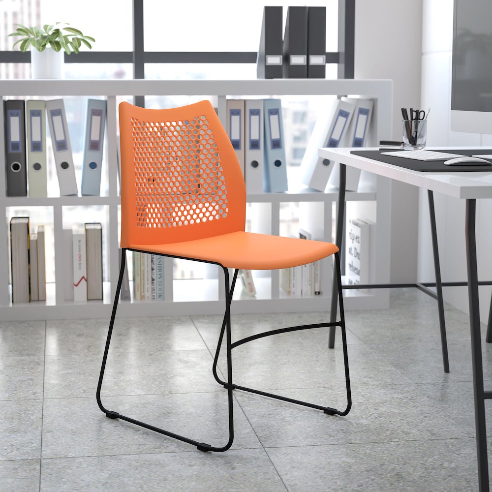 Orange Stack Chair with Air-Vent Back and Black Powder Coated Sled Base. Picture 2