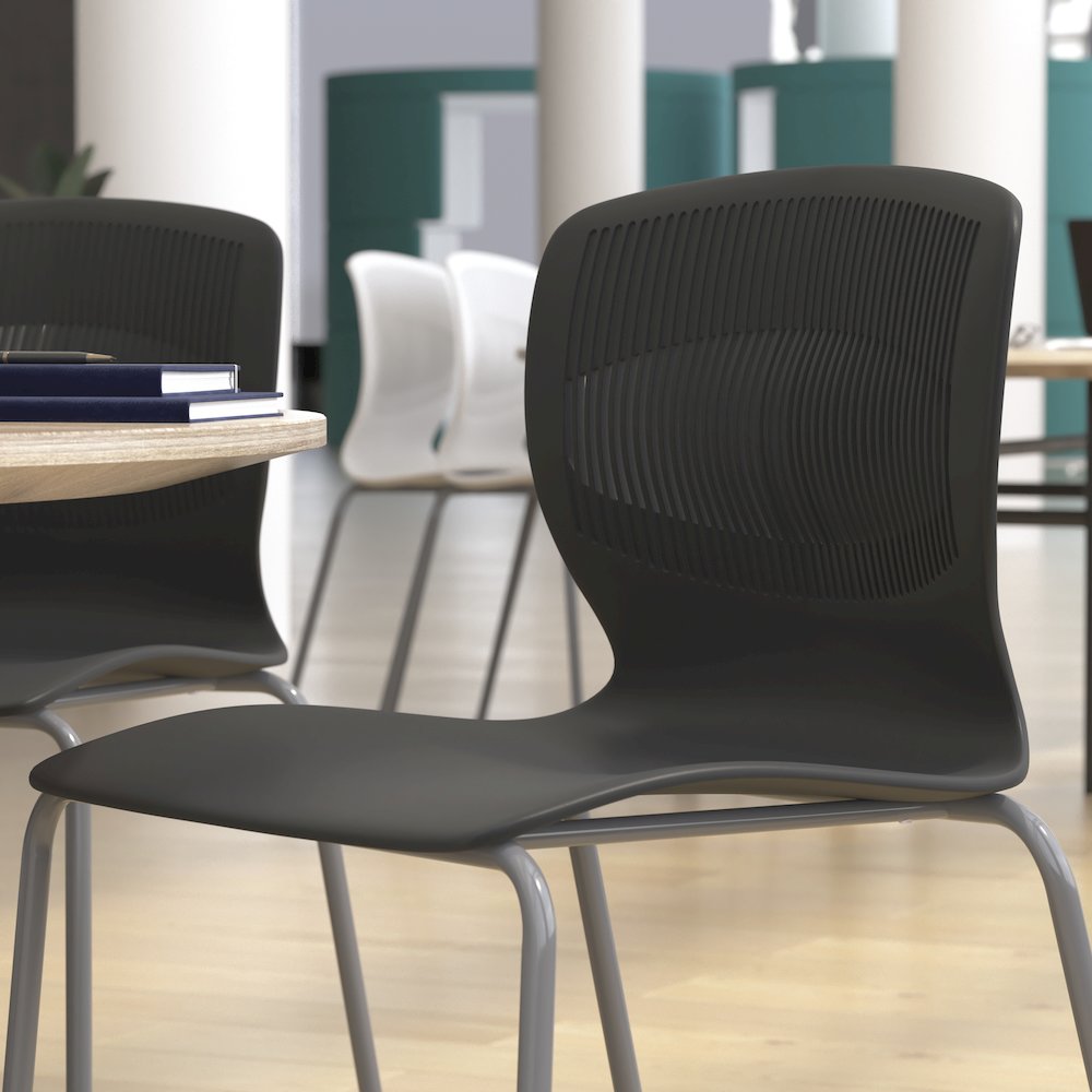 Modern Commercial Grade Stacking Chair with Lumbar Support. Picture 7