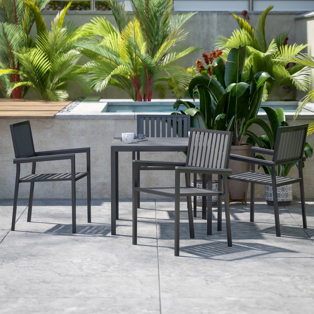 5 Piece Table and Chairs with Black Poly Resin Slatted Backs and Seats. Picture 2
