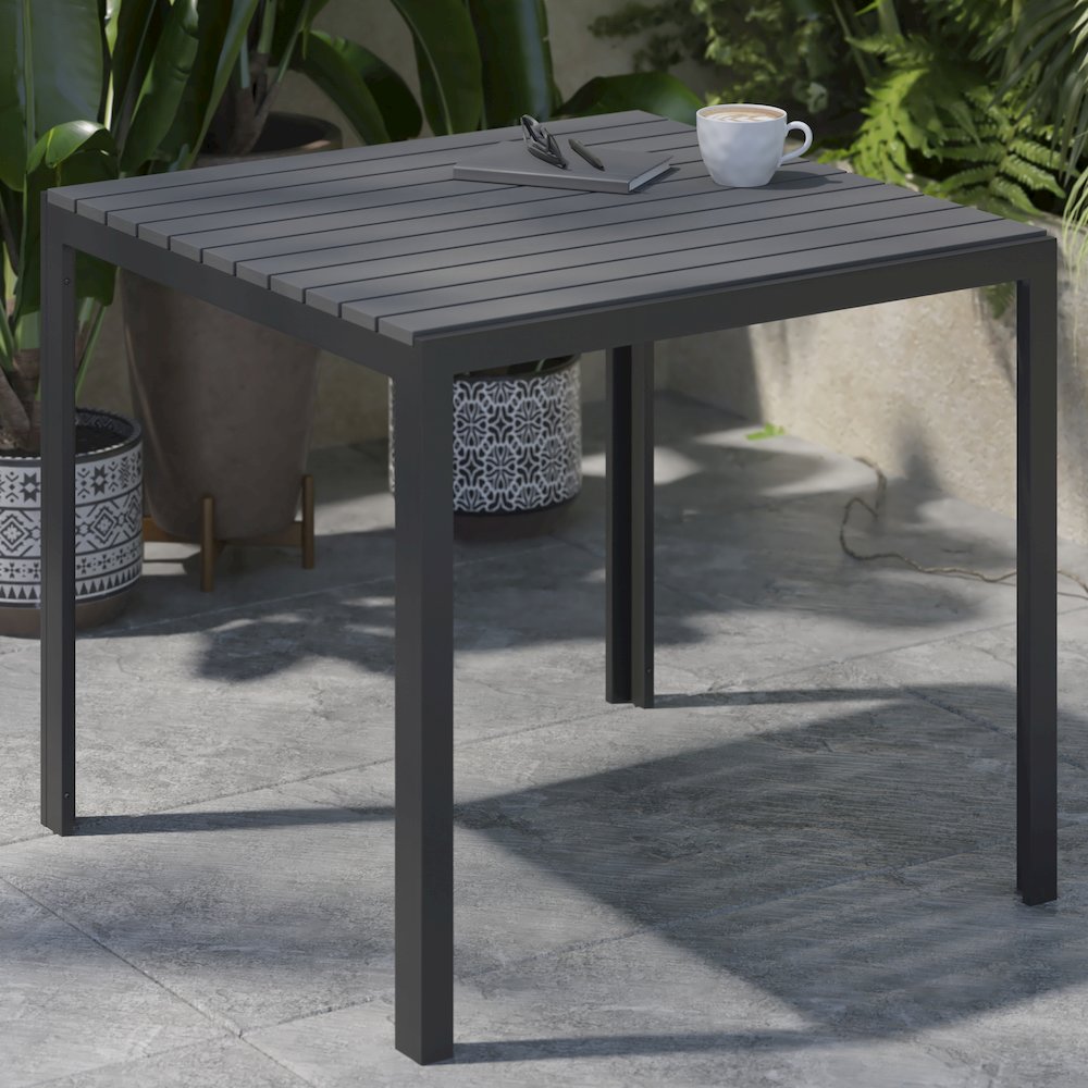 Black Steel Patio Dining Table for 4 with Black Poly Resin Slatted Top. Picture 6