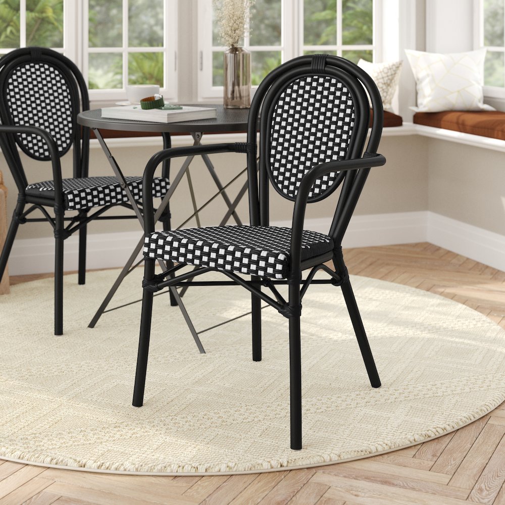 Bistro Stacking Chair with Arms, Black and White Rattan and Black Aluminum Frame. Picture 3