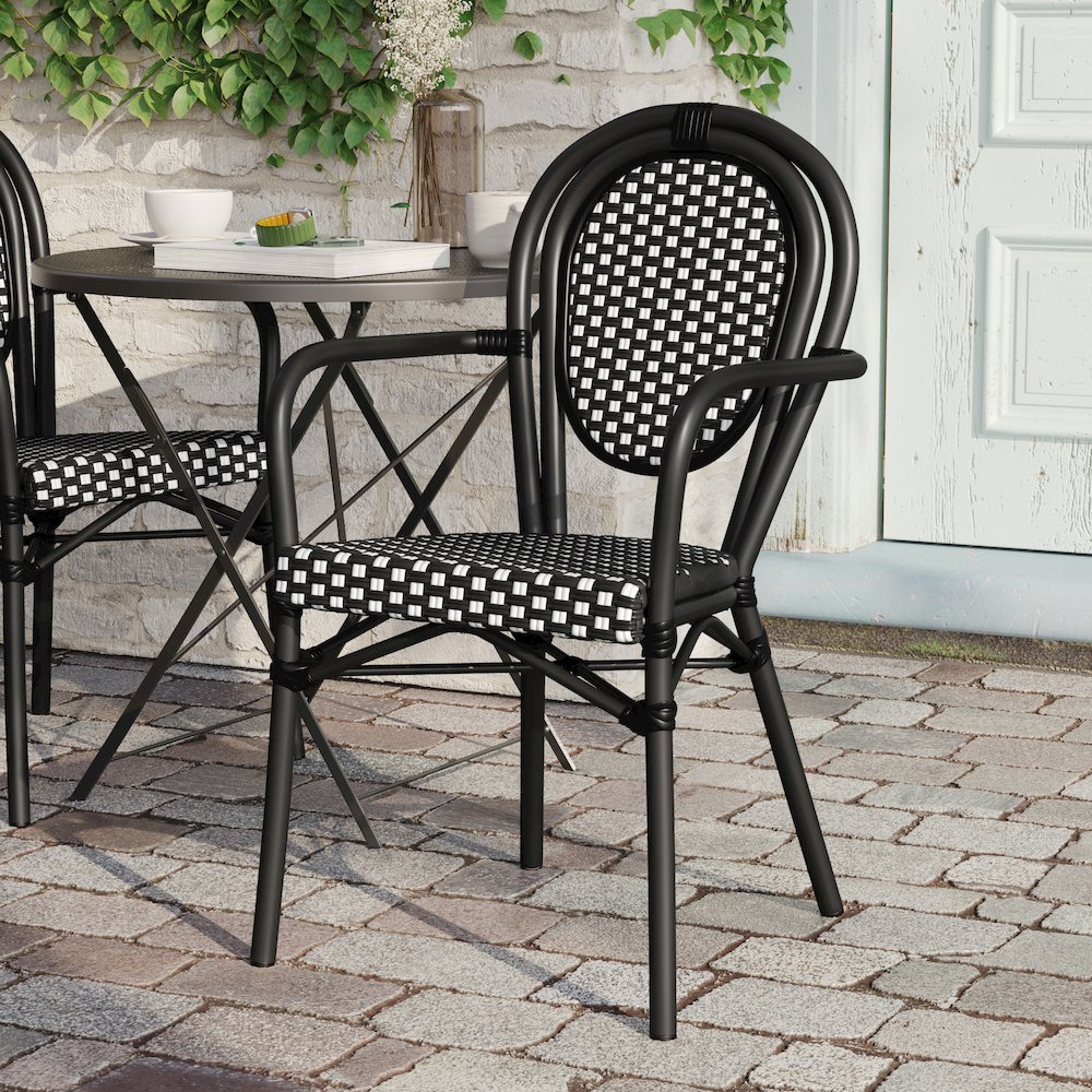 Bistro Stacking Chair with Arms, Black and White Rattan and Black Aluminum Frame. Picture 6