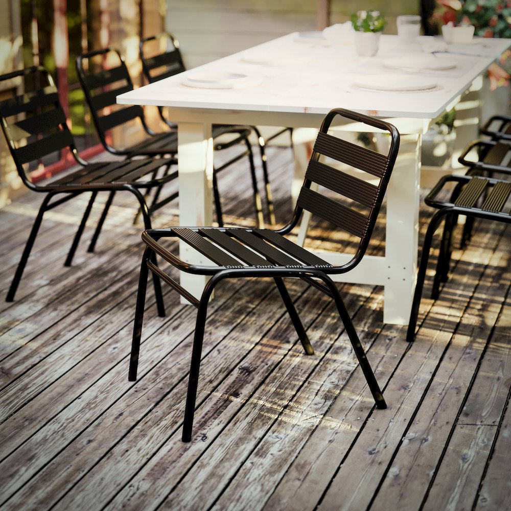 Black Metal Indoor-Outdoor Restaurant Stack Chair with Metal Triple Slat Back. Picture 7