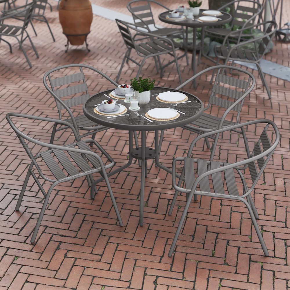 Lila 31.5'' Round Glass Top Metal Table with 4 Silver Aluminum Slat Stack Chairs. Picture 8