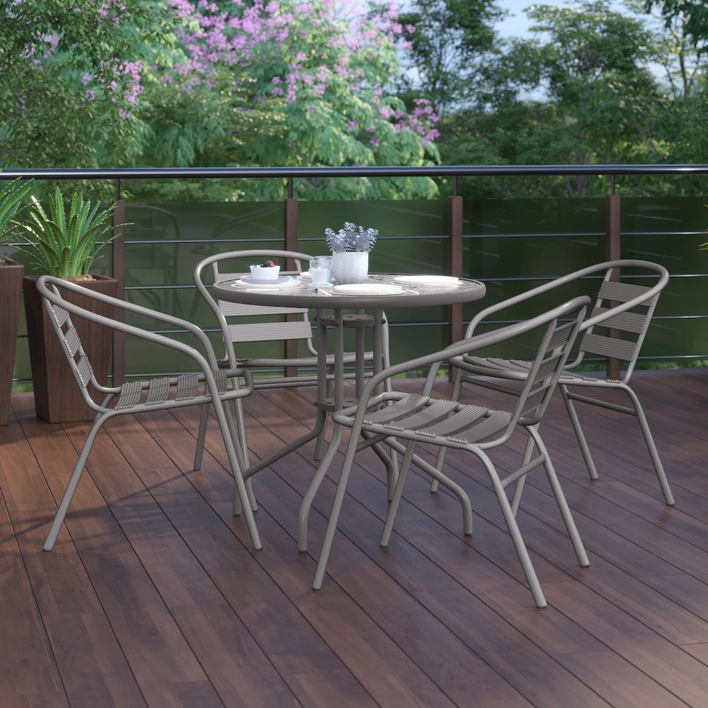 Lila 31.5'' Round Glass Top Metal Table with 4 Silver Aluminum Slat Stack Chairs. Picture 9