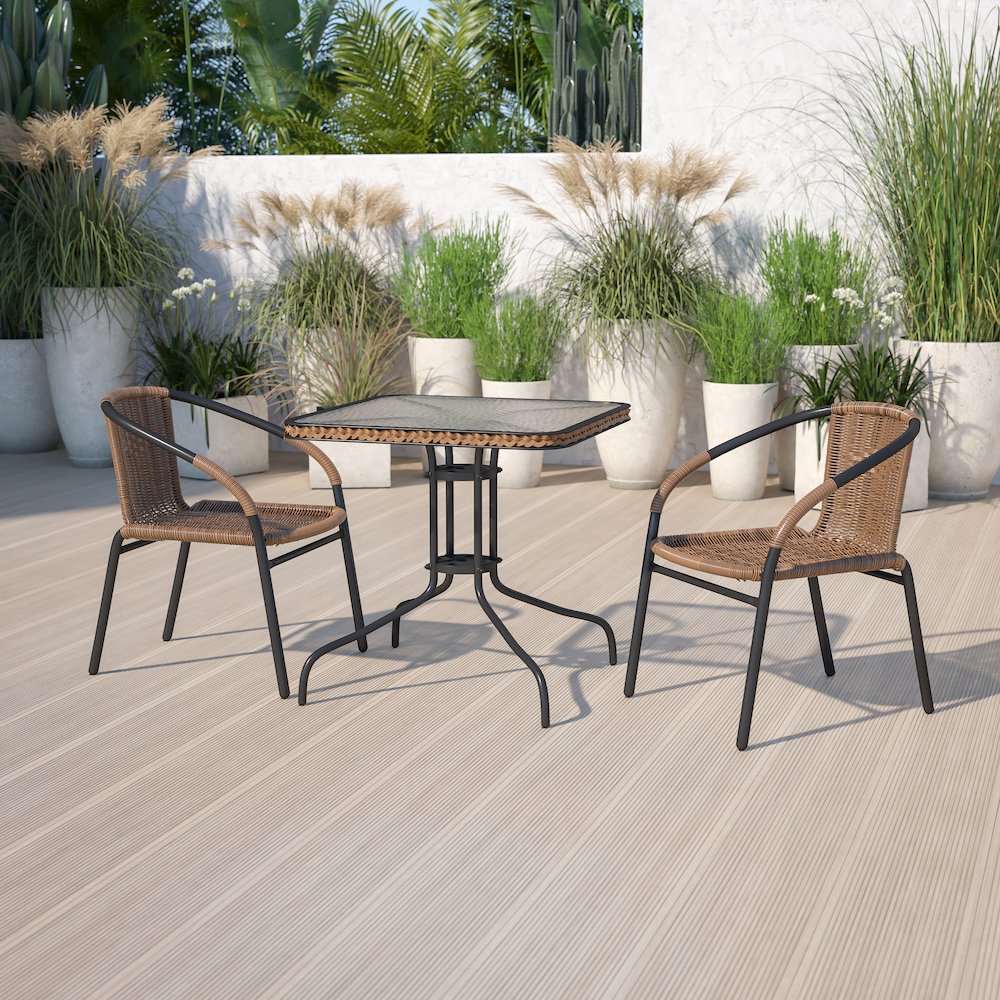 28'' Square Glass Metal Table with Dark Brown Rattan Edging and 2 Dark Brown Rattan Stack Chairs. Picture 4