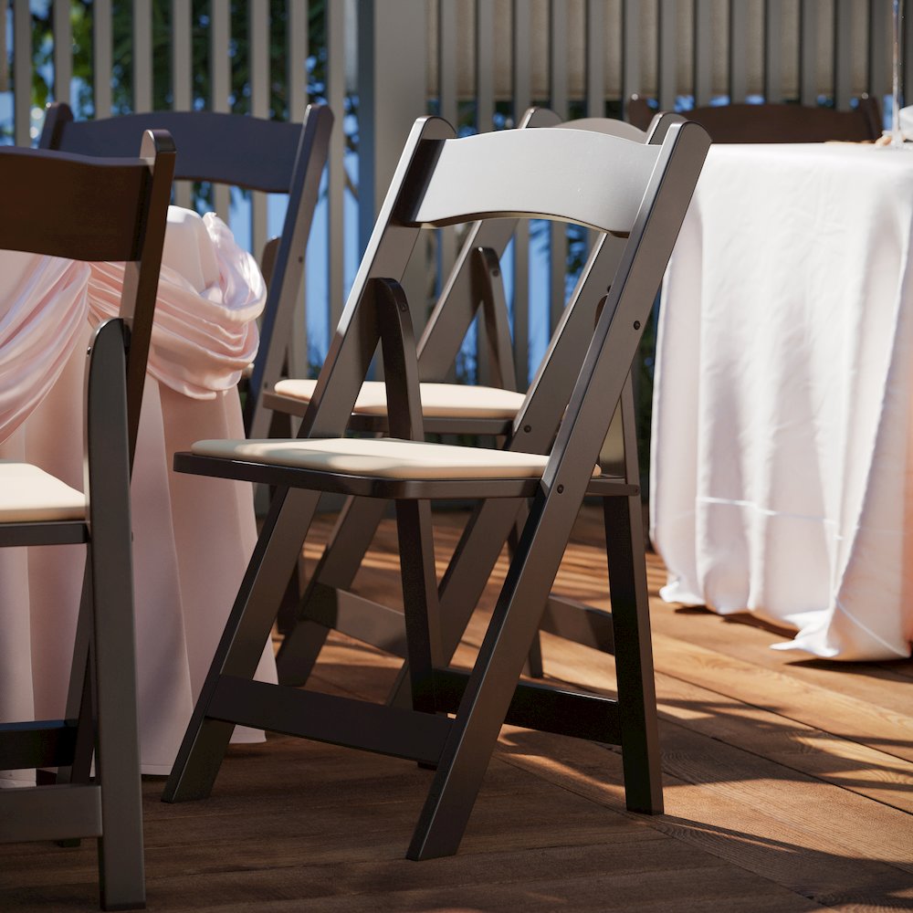 Chocolate Wood Folding Chair with Vinyl Padded Seat. Picture 2