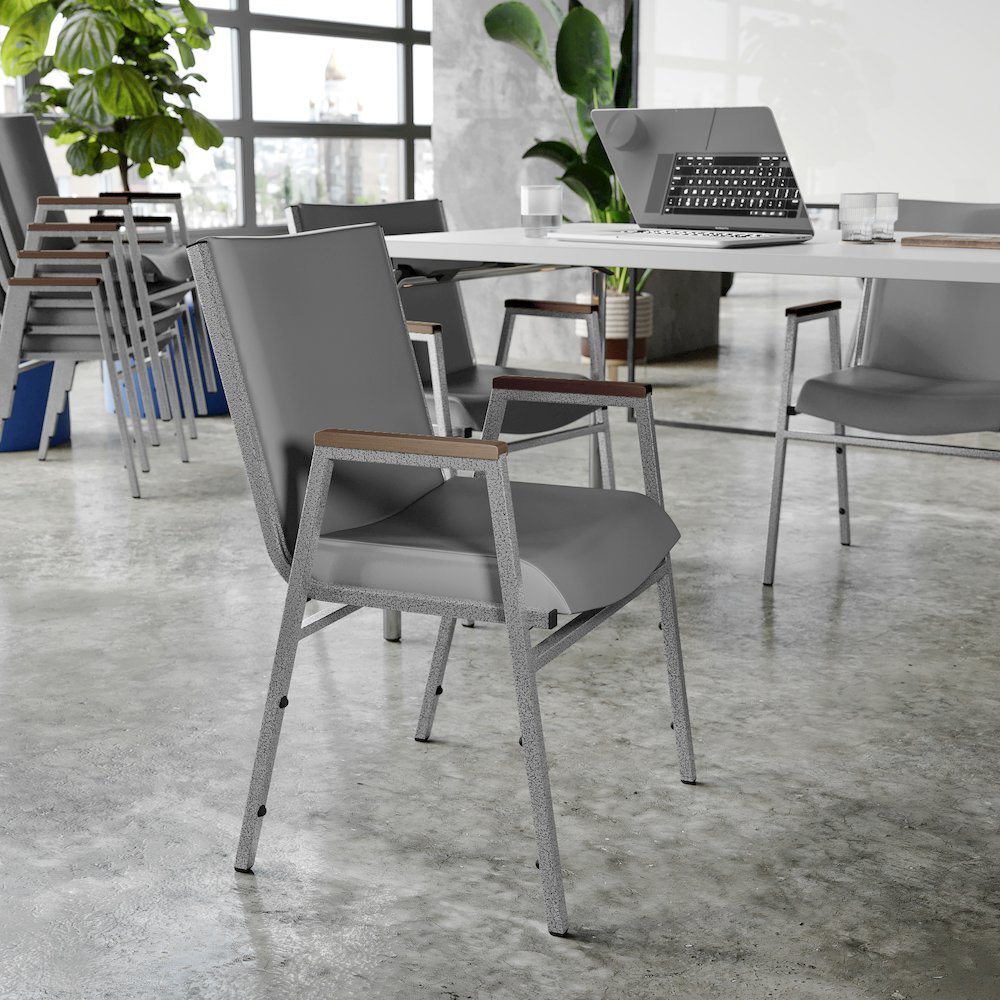 HERCULES Heavy Duty Gray Vinyl Stack Chair with Arms. Picture 5
