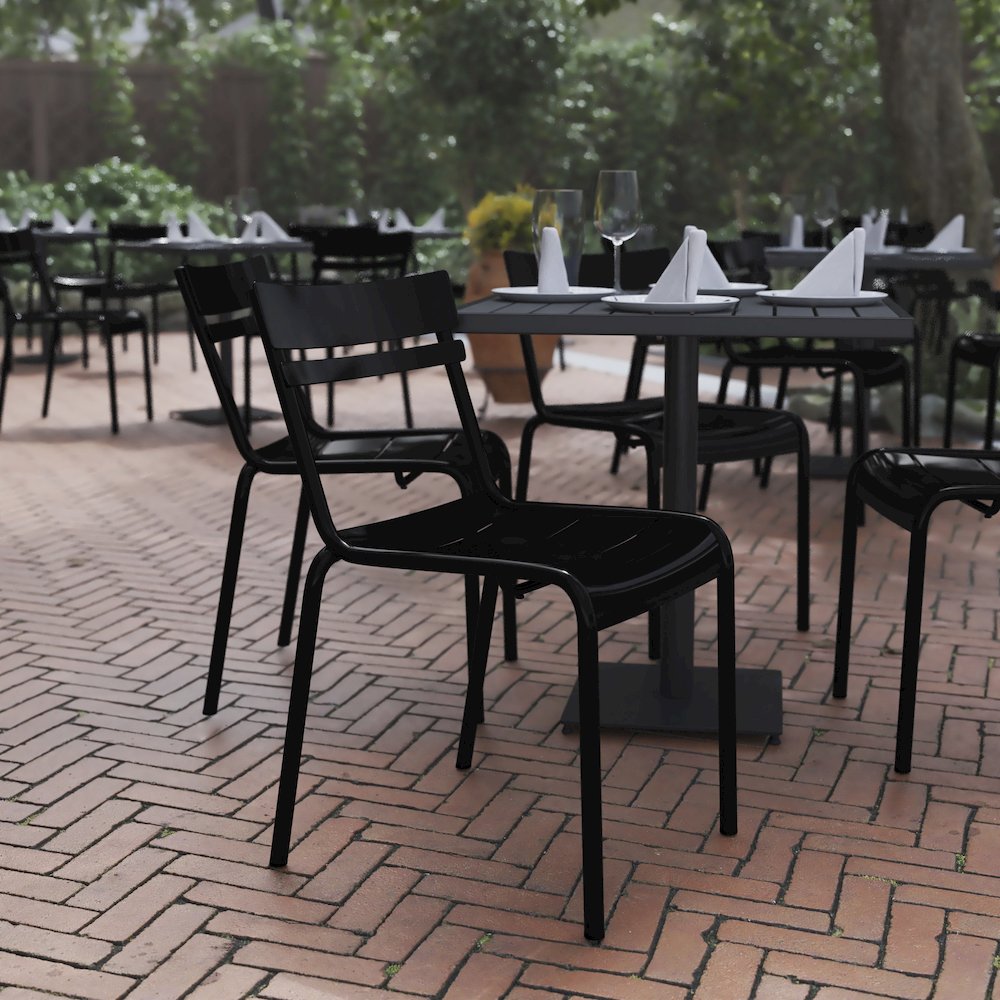 Modern Commercial Grade Indoor/Outdoor Armless Steel Stack Chair. Picture 2