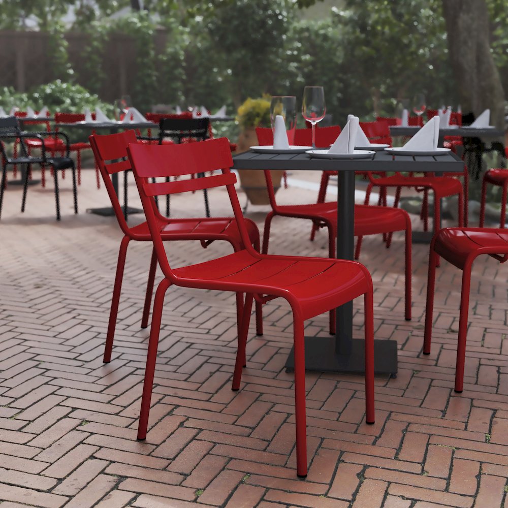 Modern Commercial Grade Indoor/Outdoor Armless Steel Stack Chair. Picture 2