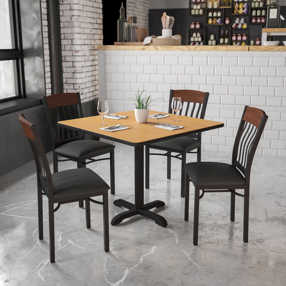 Vertical Back Black Metal and Walnut Wood Restaurant Chair with Black Vinyl Seat. Picture 2