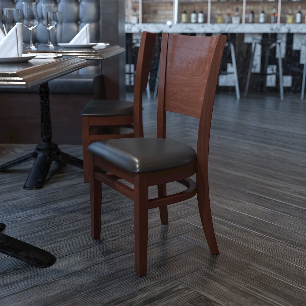 Solid Back Walnut Wood Restaurant Chair - Black Vinyl Seat. Picture 2