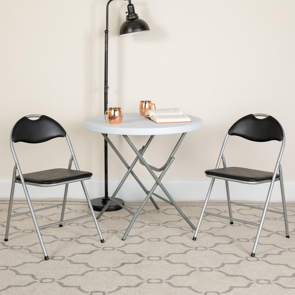 HERCULES Series Black Vinyl Metal Folding Chair with Carrying Handle. Picture 2
