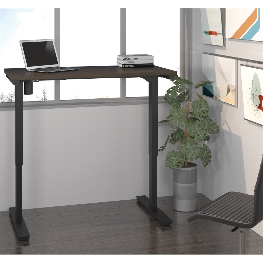 24" x 48" Electric Height adjustable table in Dark Chocolate. Picture 2
