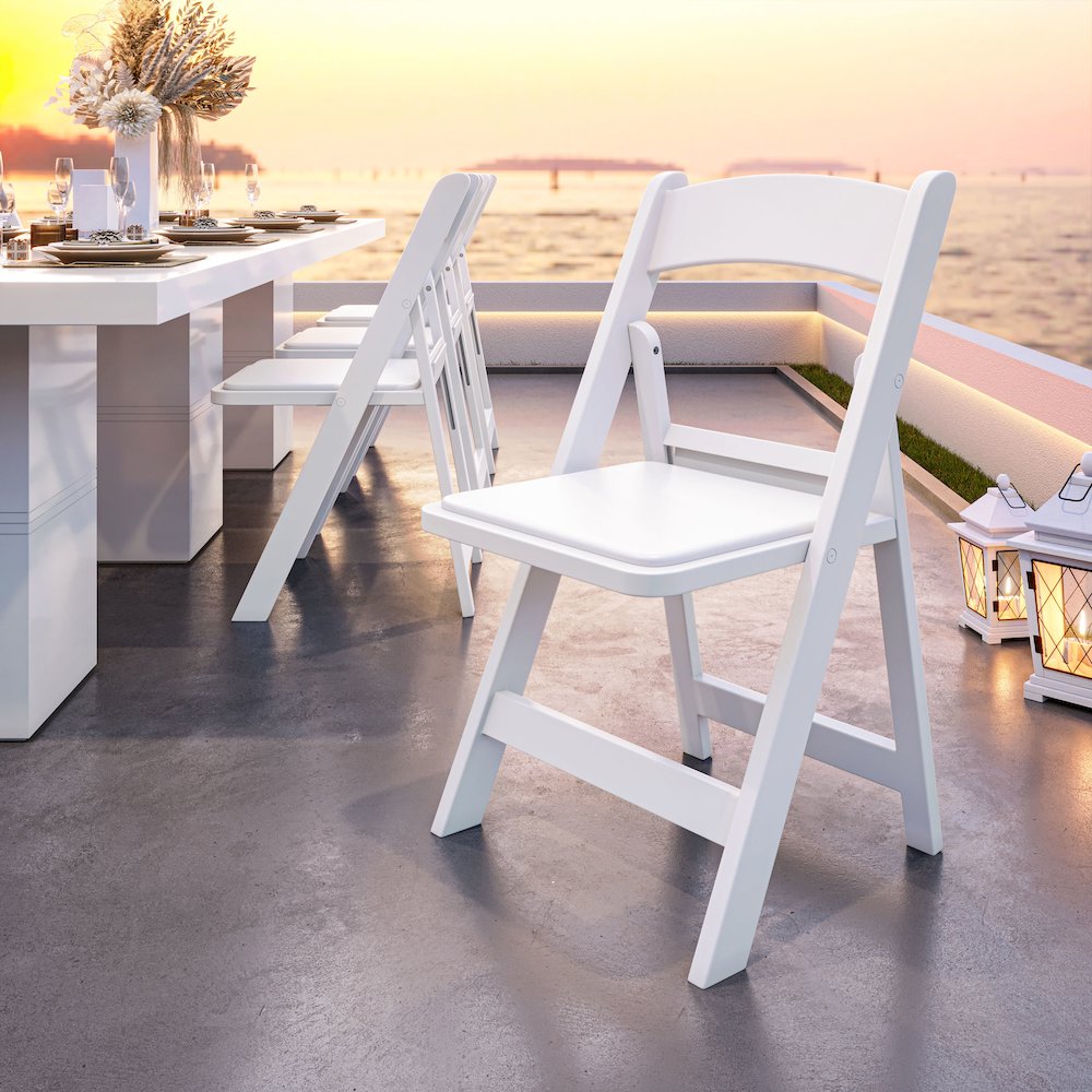4-Pack White Resin Folding Chairs with Padded Seat. Picture 9