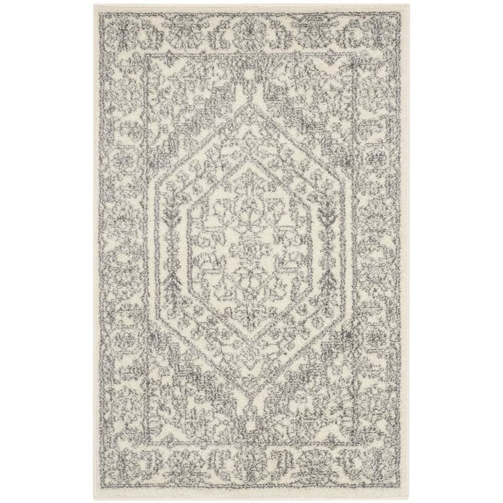 Ivory and Silver Area Rug with Power Loomed Polypropylene Pile for Accent Spaces. Picture 1