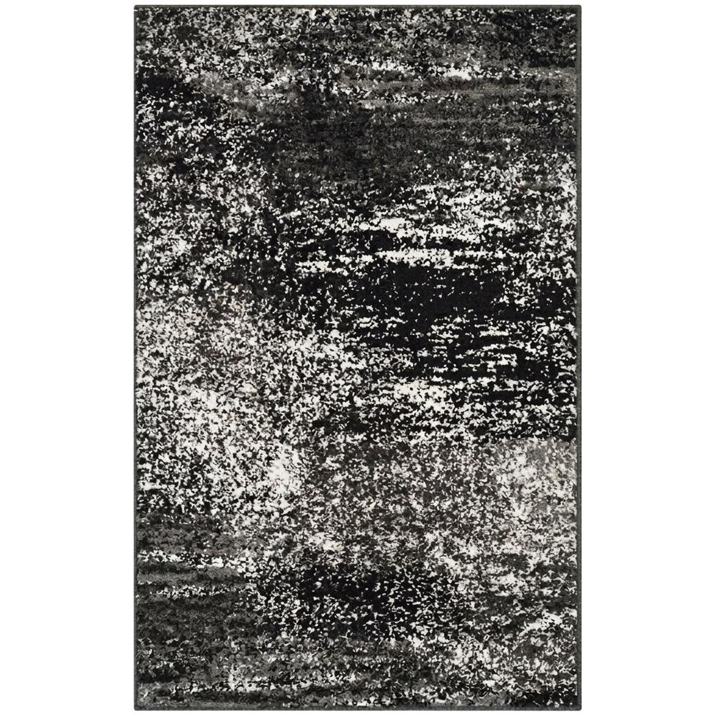 Gray and Black Area Rug with Power Loomed Polypropylene Pile for Accent Spaces. Picture 4