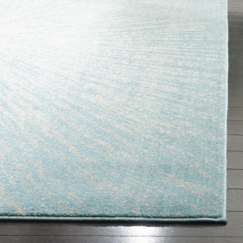 EVOKE, AQUA / IVORY, 5'-1" X 7'-6", Area Rug. Picture 1
