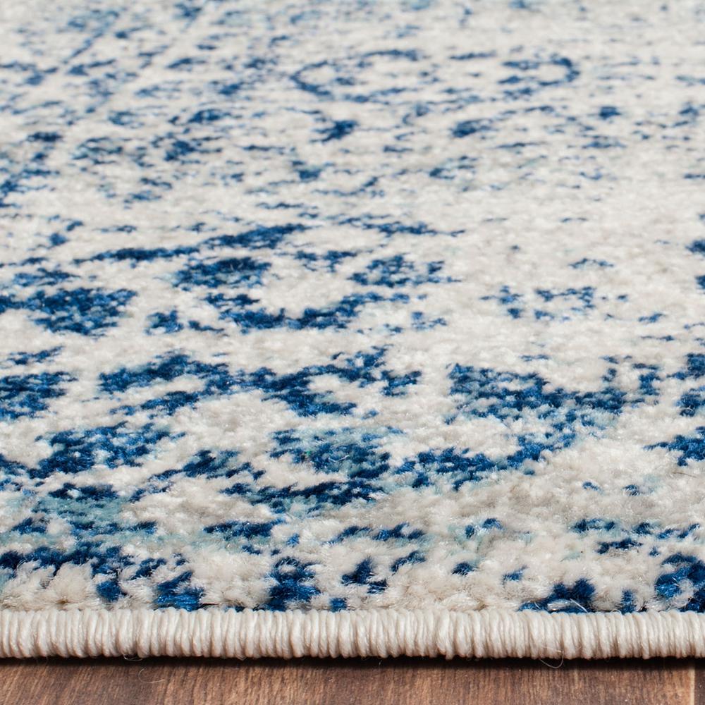 EVOKE, IVORY / BLUE, 6'-7" X 9', Area Rug, EVK260C-6. Picture 1