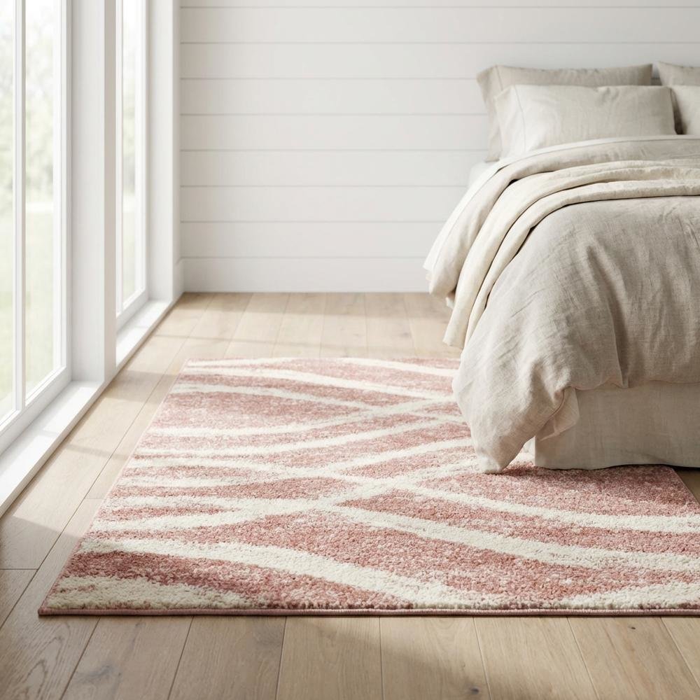 Cream and rose area rug with power loomed polypropylene pile in accent shape. Picture 2