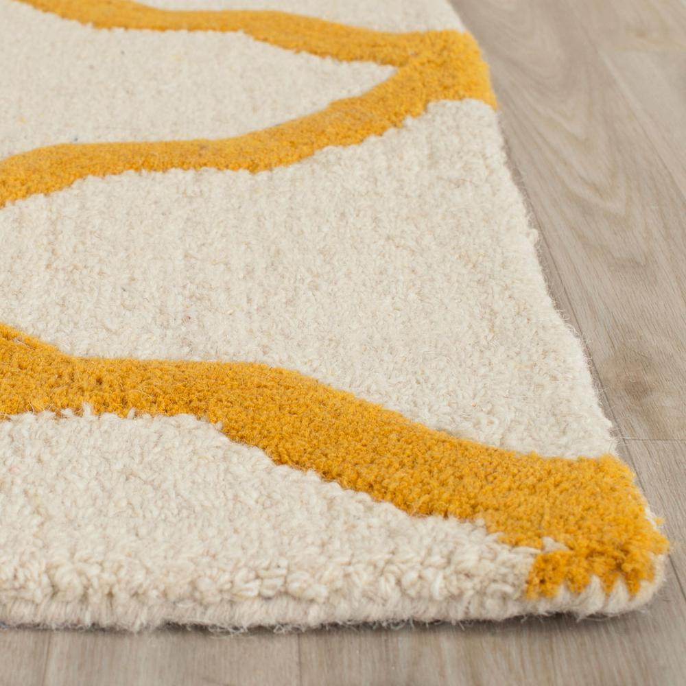 CAMBRIDGE, IVORY / GOLD, 6' X 9', Area Rug. Picture 1