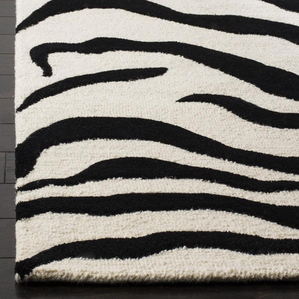 CAMBRIDGE, IVORY / BLACK, 5' X 8', Area Rug, CAM709Q-5. Picture 1